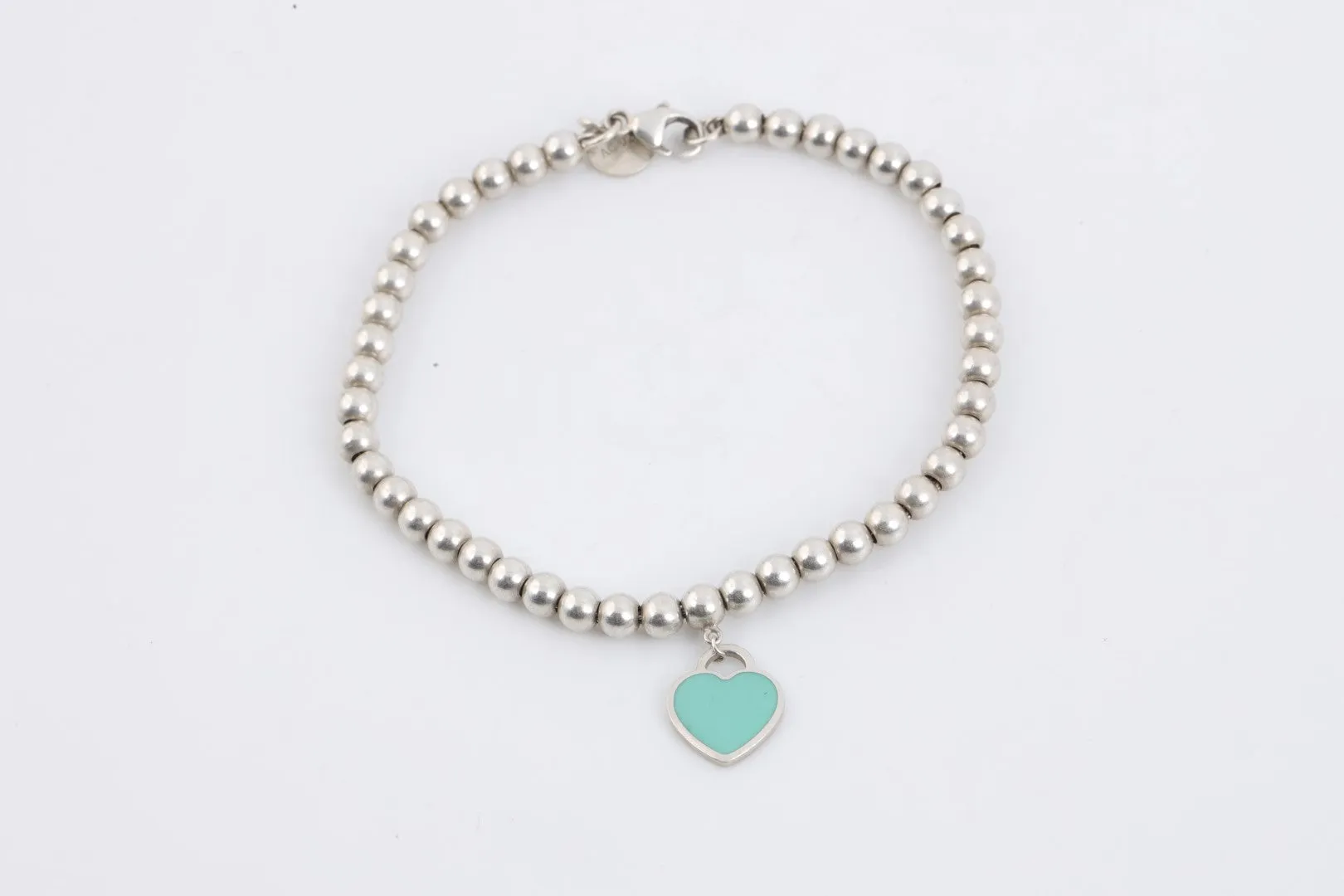 7" Tiffany & Co. 925 Silver Blue Enamel Heart Tag Bracelet (5.56g.)